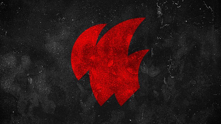 Na ciemnym, surowym tle przypominającym czarną, metalową lub betonową powierzchnię widoczny jest duży, czerwony symbol ognia. Znak ma uproszczoną, dynamiczną formę płomienia i wyróżnia się intensywnym kolorem na tle chropowatej, lekko zabrudzonej faktury. Grafika jest minimalistyczna, kontrastowa i skupia uwagę na wyrazistym symbolu żywiołu ognia.